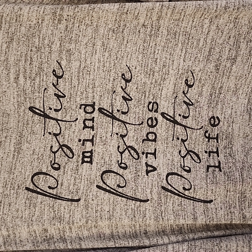 2x light gray shirt with positive phrase